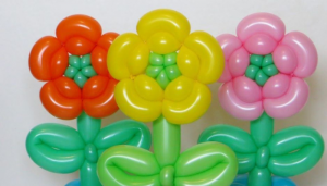 c贸mo hacer flores con globos